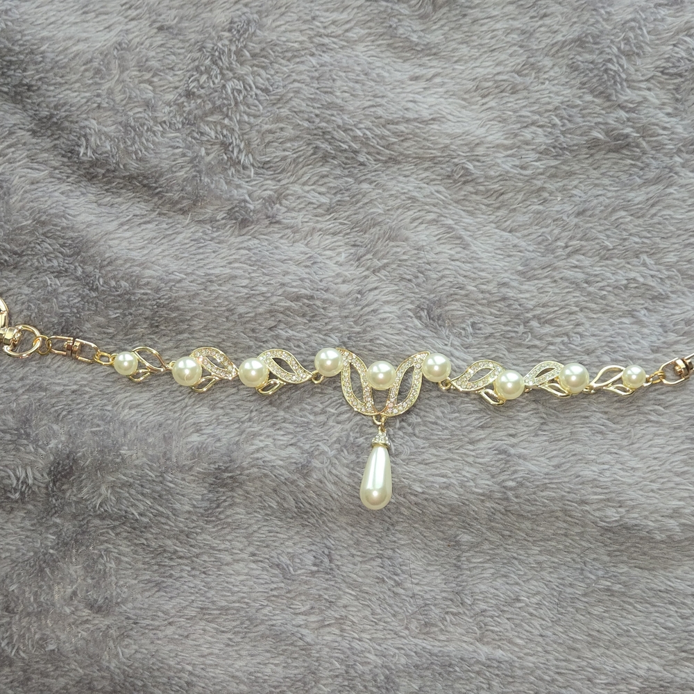 Elegant Gold and Pearl Purse Charm Swag